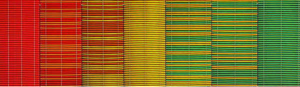 Image of multicoloured woven fabric: warm shades